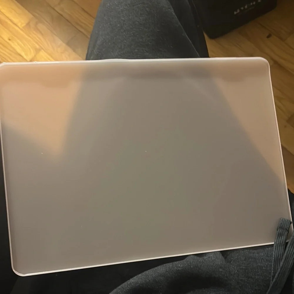 Apple Laptop with Pink Cover